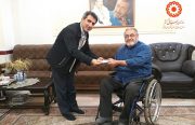 تجلیل از ورزشکار جانباز حاج اسدالله عظیمی
